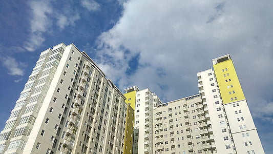 worm's-eye view photography of white concrete building thumbnail