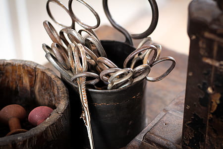 gray metal scissors in container thumbnail