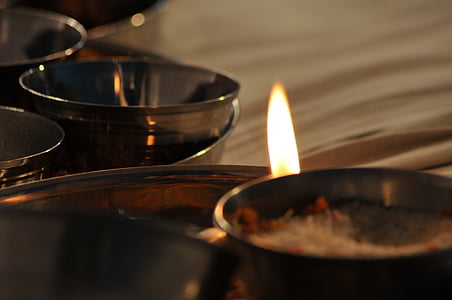 small fire between gray stainless steel containers thumbnail