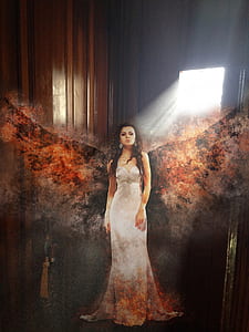woman with burning wings standing near door thumbnail