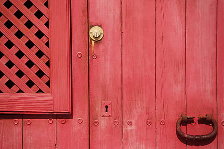 closed red wooden door thumbnail