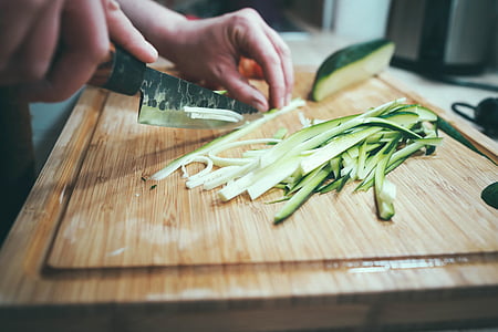 person chopping vegetable thumbnail