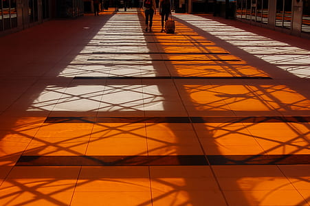 woman women walking on hallway during daytime thumbnail