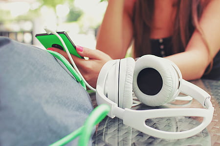 white stereo headphones on gray table thumbnail