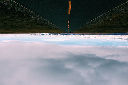 cleared road under cloudy sky during daytime thumbnail