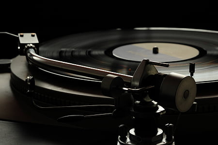 time-lapse photography of spinning vinyl disc on vinyl player thumbnail