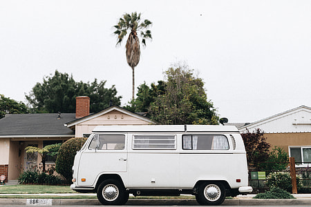 white van parked under house background during daytime thumbnail