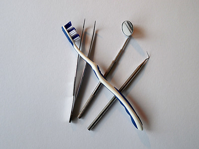 white and black toothbrush thumbnail