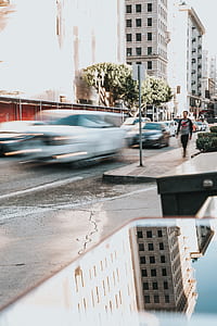 man walking beside the street thumbnail