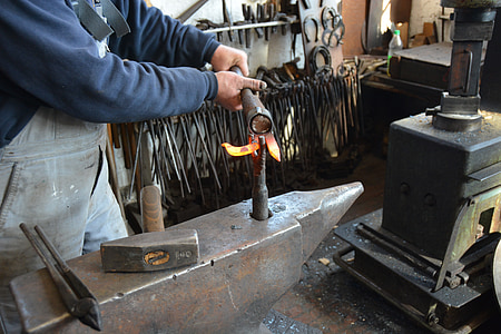 man using brown metal tool thumbnail