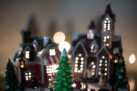 close-up photograph of red and white ceramic Christmas village miniature thumbnail