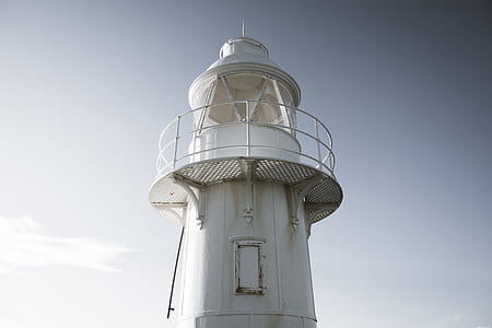 white lighthouse during daytime thumbnail