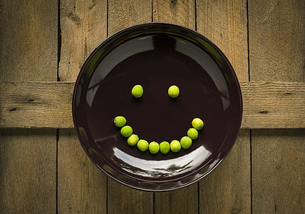 green seeds on brown plate thumbnail