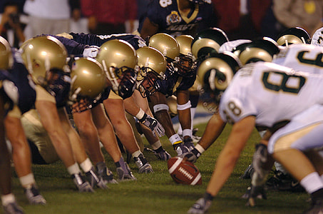 two group of men playing football thumbnail