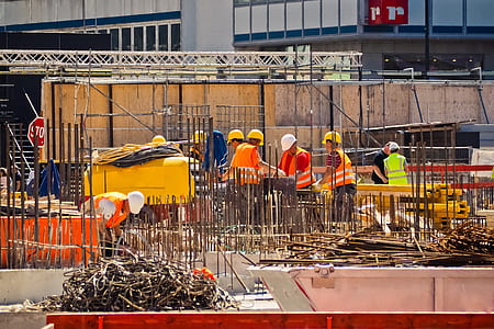 workers wearing vest during daytime thumbnail
