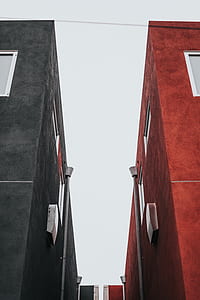 red and black concrete buildings thumbnail