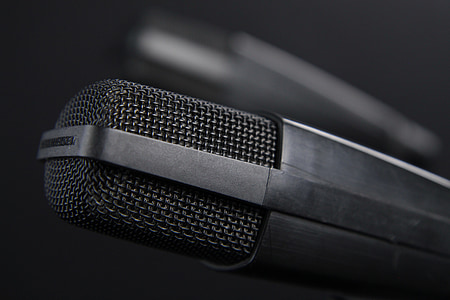 shallow focus photo of black microphone thumbnail
