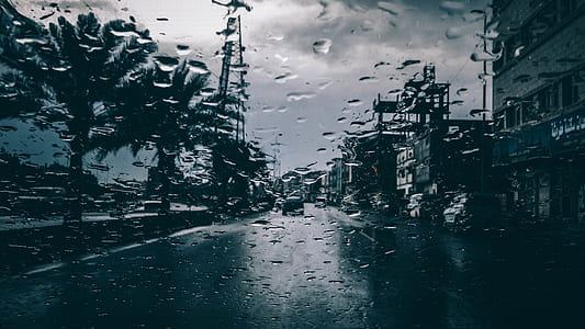 photography of wet glass with a scene of road thumbnail