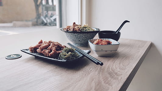 meat food on black dish on table thumbnail