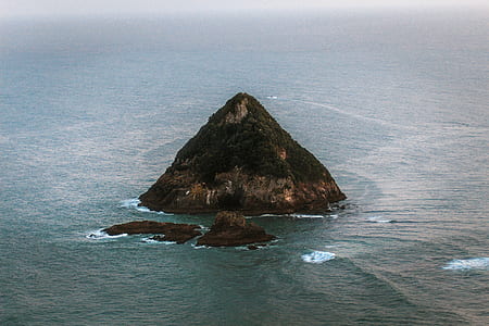 island during daytime thumbnail
