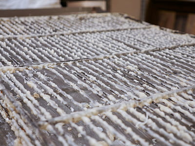Bakery racks covered in glaze. thumbnail