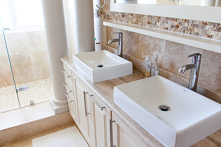 two white ceramic sinks thumbnail
