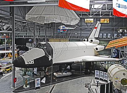white and black spaceship inside room thumbnail