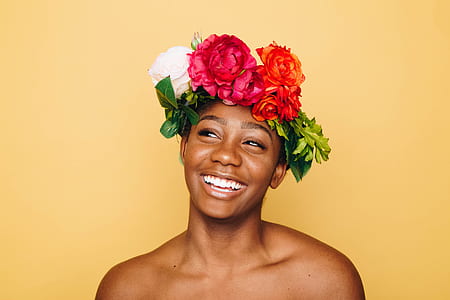 woman wearing white and pink floral hat thumbnail