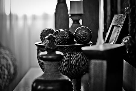 Grayscale Photography of Home Decorations Near Window thumbnail