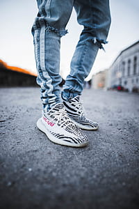 person standing on concrete pavement thumbnail