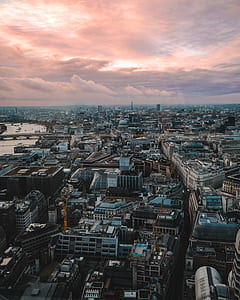 structural shot of buildings under cloudy sky thumbnail