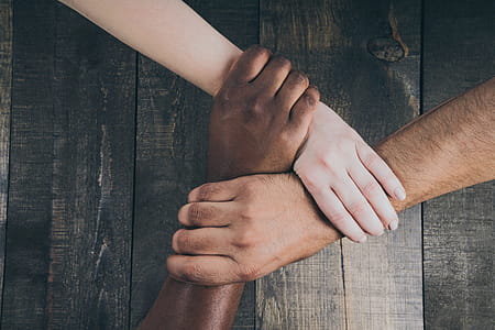 Team Hands Linked Together Photo thumbnail