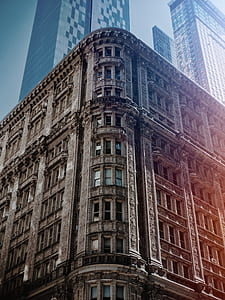 brown concrete building low-angle photo thumbnail