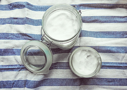 two clear glass mason jars with creams thumbnail