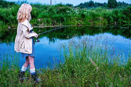 woman holding fishing rod thumbnail
