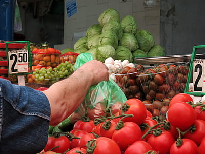 person holding bag of vegetable thumbnail