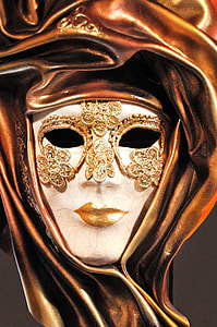 closeup photo of white mask with shawl statue thumbnail