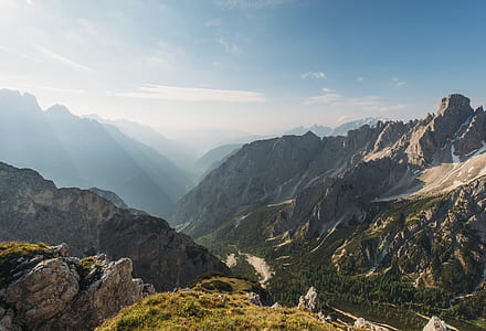 aerial photography of mountain with river during daytime thumbnail