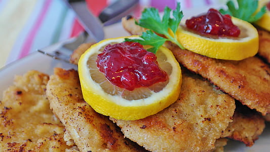 breaded fish with tartar and lemon slice thumbnail