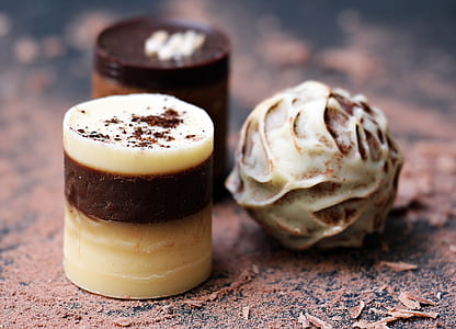 two cylindrical and round chocolates thumbnail