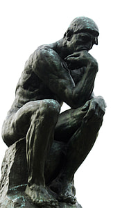 low-angle photography of sitting man statue during daytime thumbnail