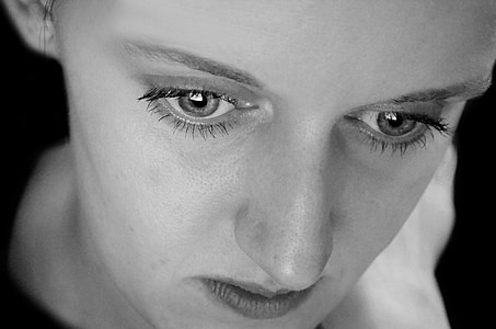 closeup grayscale photo of woman's face thumbnail