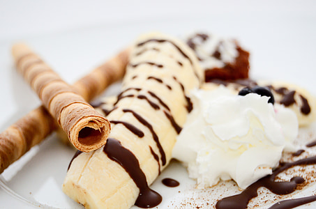 banana with chocolate syrup and wafer stick thumbnail