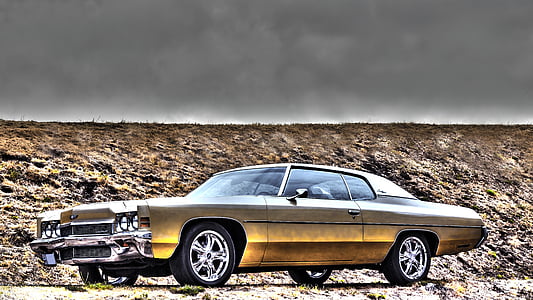 gold-colored coupe thumbnail