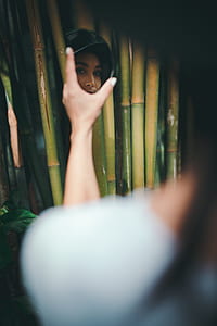 woman's face reflected on mirror thumbnail