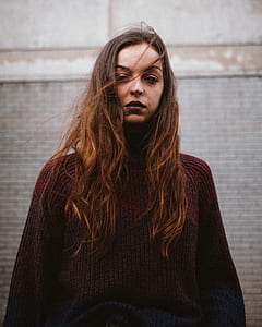 woman wearing purple sweater thumbnail
