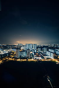 aerial photography of city skyline with lights thumbnail