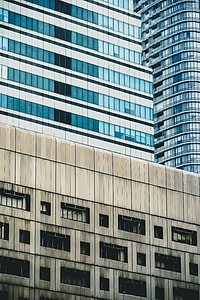 low angle photography of gray concrete building thumbnail