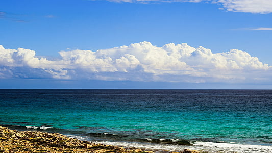 body of water near land thumbnail