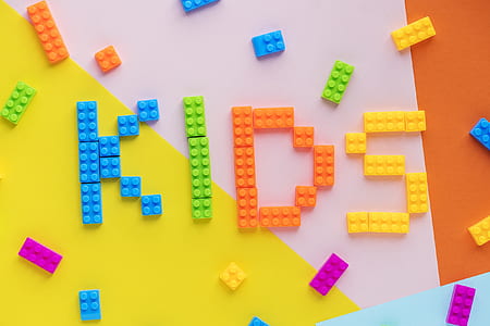 flat-lay photography of kids-spelled interlocking toy block thumbnail